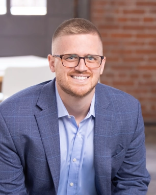 portrait of a smiling man in business attire